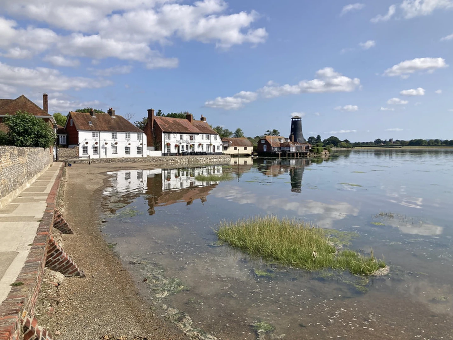 An image depicting the trail Langstone Mill Pond and its surrounding area.