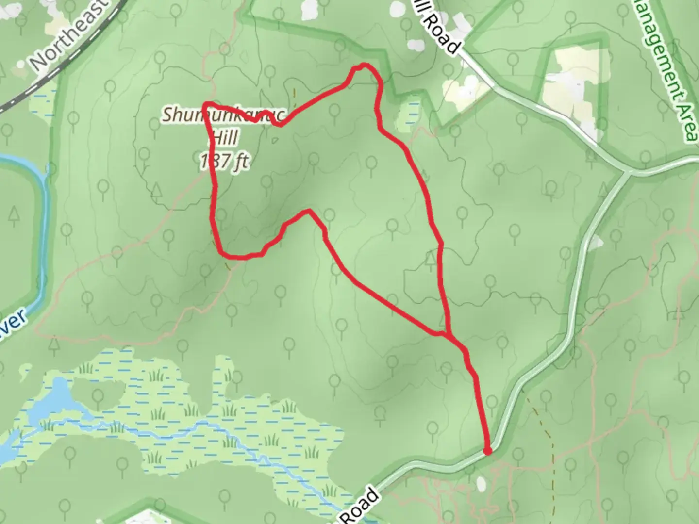 An image depicting the trail Shumunkanuc Hill Loop and its surrounding area.