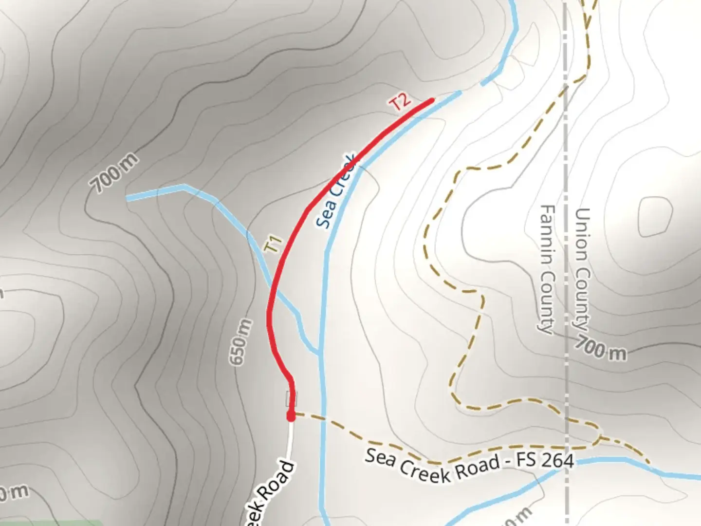 An image depicting the trail Sea Creek and its surrounding area.