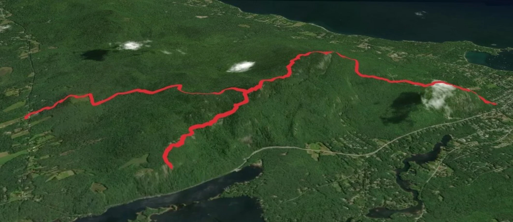An image depicting the trail Mount Megunticook and Cameron Mountain and its surrounding area.