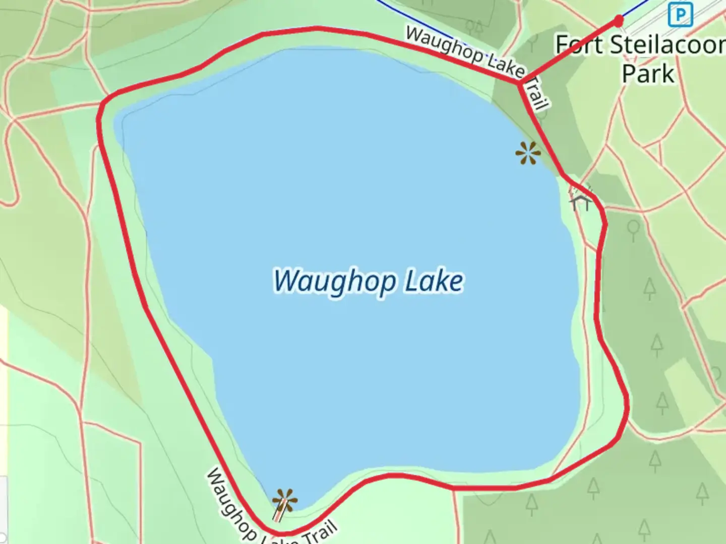 An image depicting the trail Waughop Lake Loop Trail and its surrounding area.