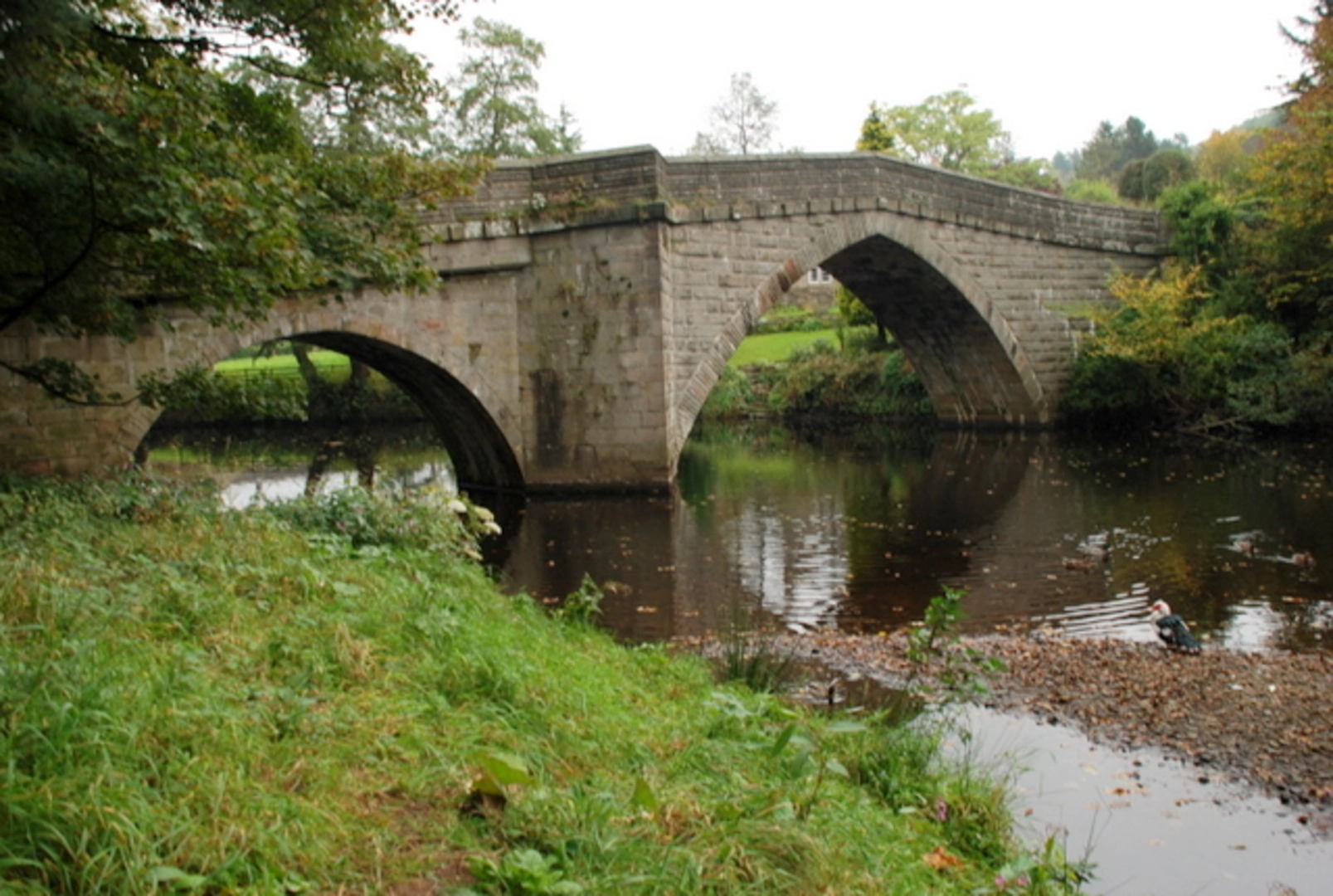 An image depicting the trail Froggatt to Curbar Loop via River Derwent and its surrounding area.