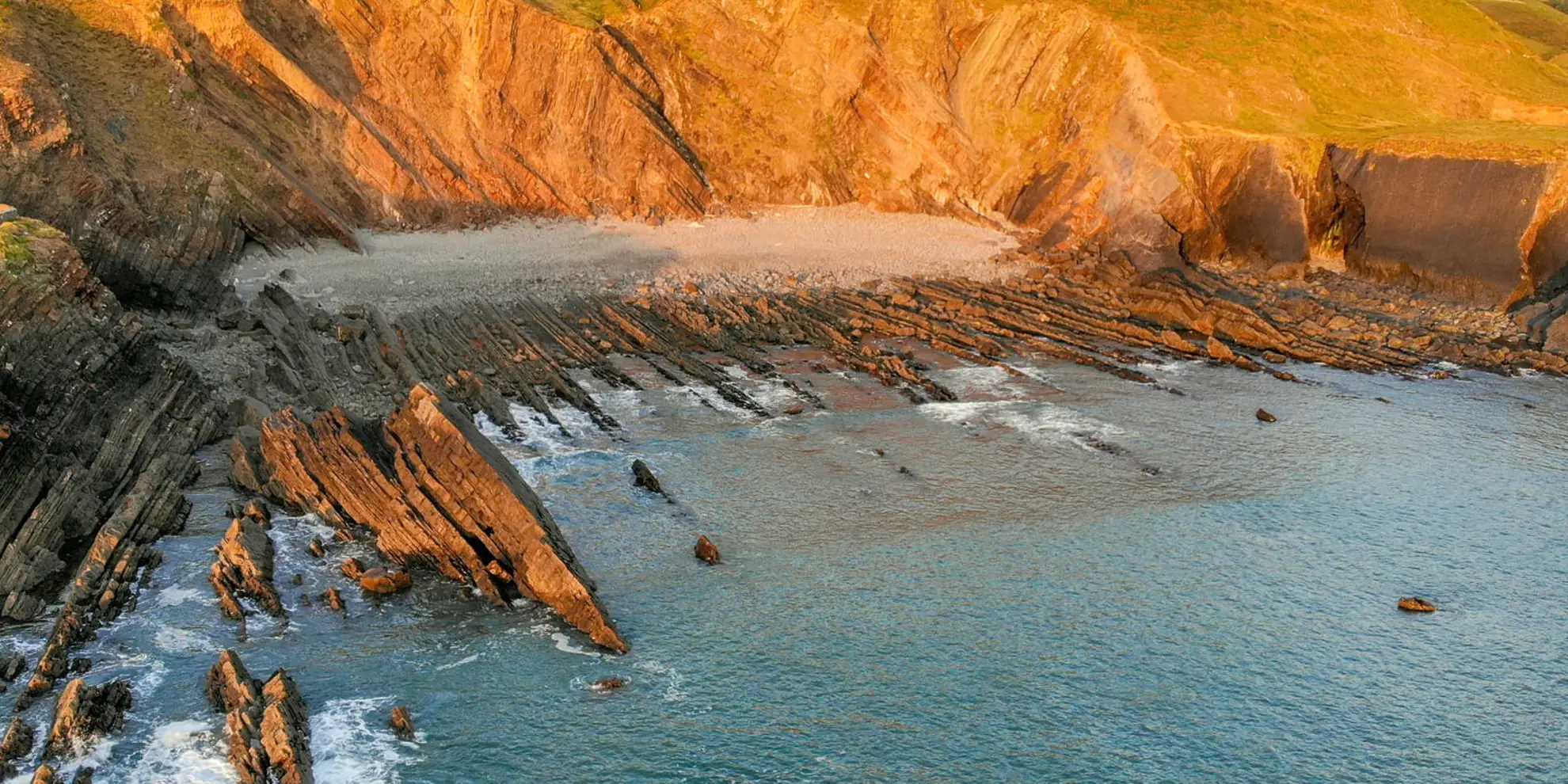 An image depicting the trail Stoke and Hartland Quay from Elmscott and its surrounding area.