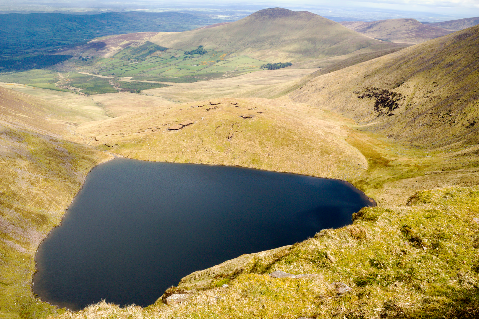 An image depicting the trail Lough Curra Loop and its surrounding area.