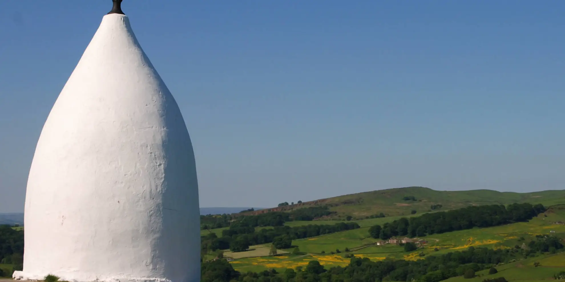 An image depicting the trail White Nancy and Saddle of Kerridge Nr Bollington and its surrounding area.