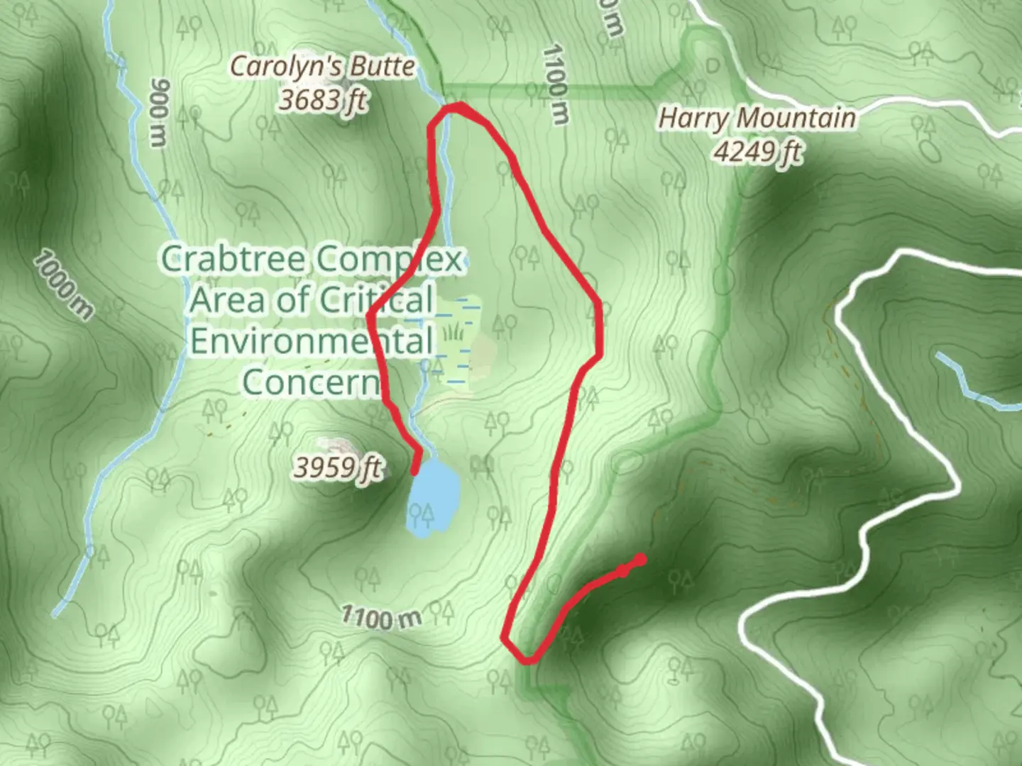 An image depicting the trail Crabtree Lake and its surrounding area.