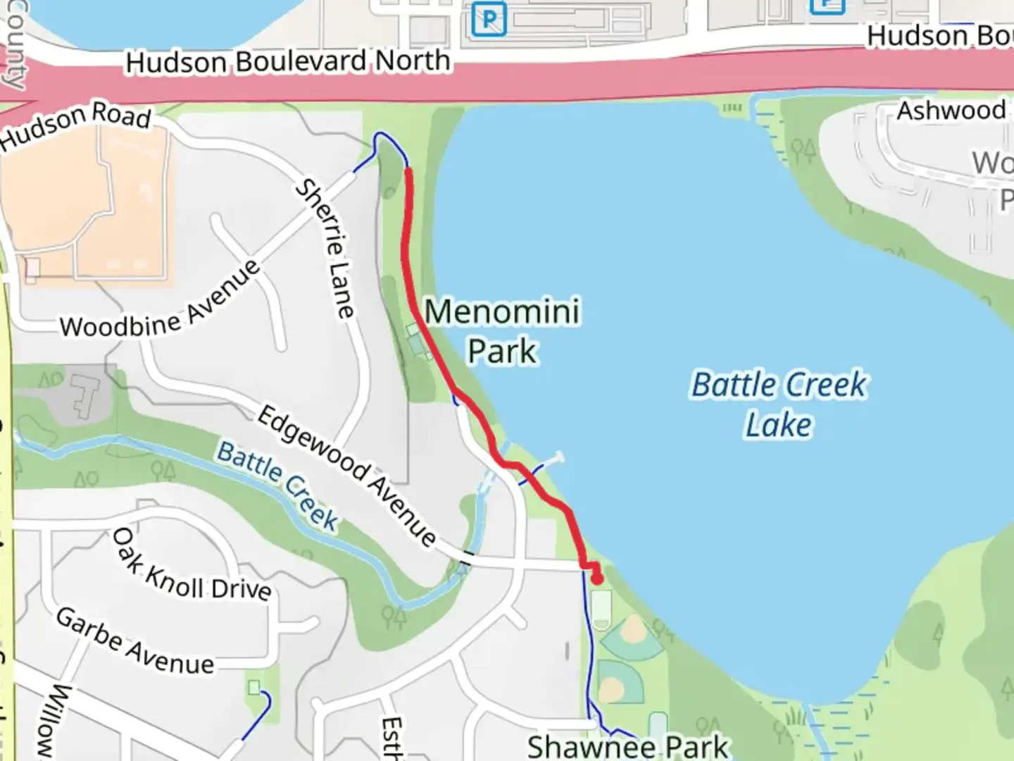 An image depicting the trail Menomini Park via Battle Creek Lake and its surrounding area.