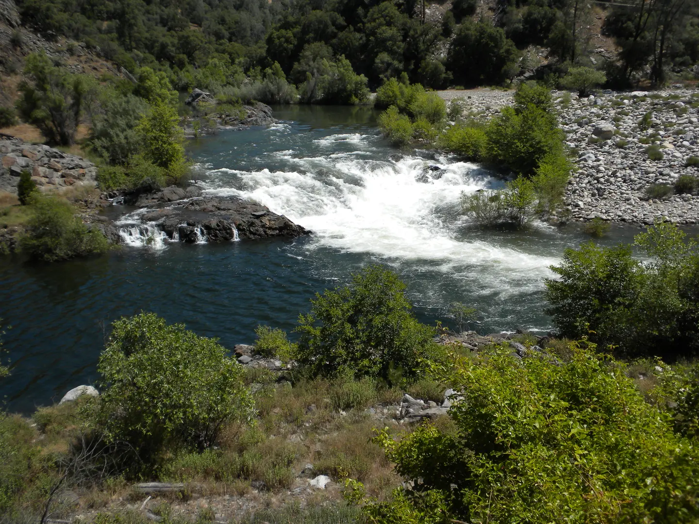 An image depicting the trail South Fork Stanislaus River and its surrounding area.