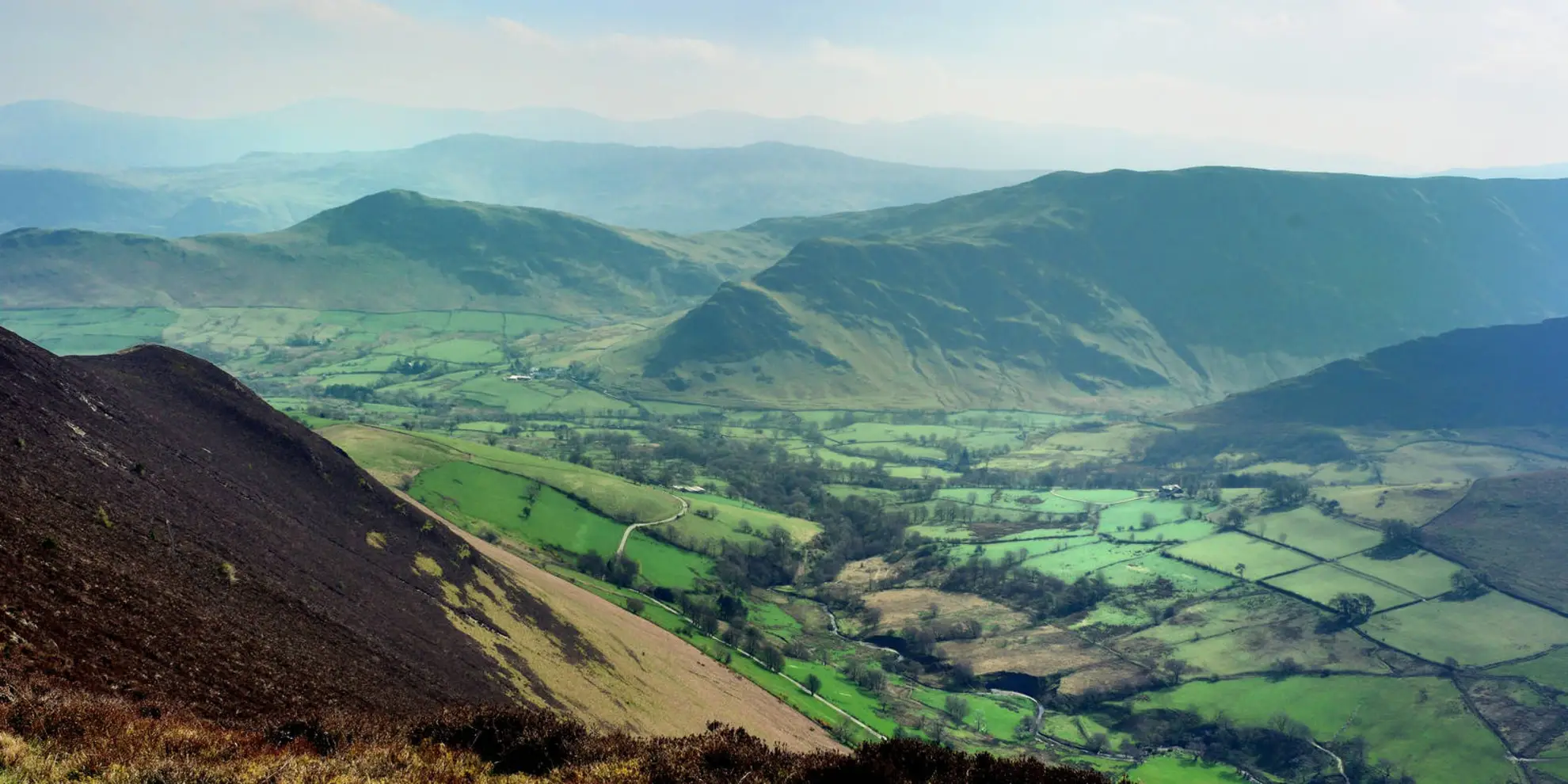 An image depicting the trail Robinson, Knott Rigg and Ard Crags from High Snab Farm and its surrounding area.
