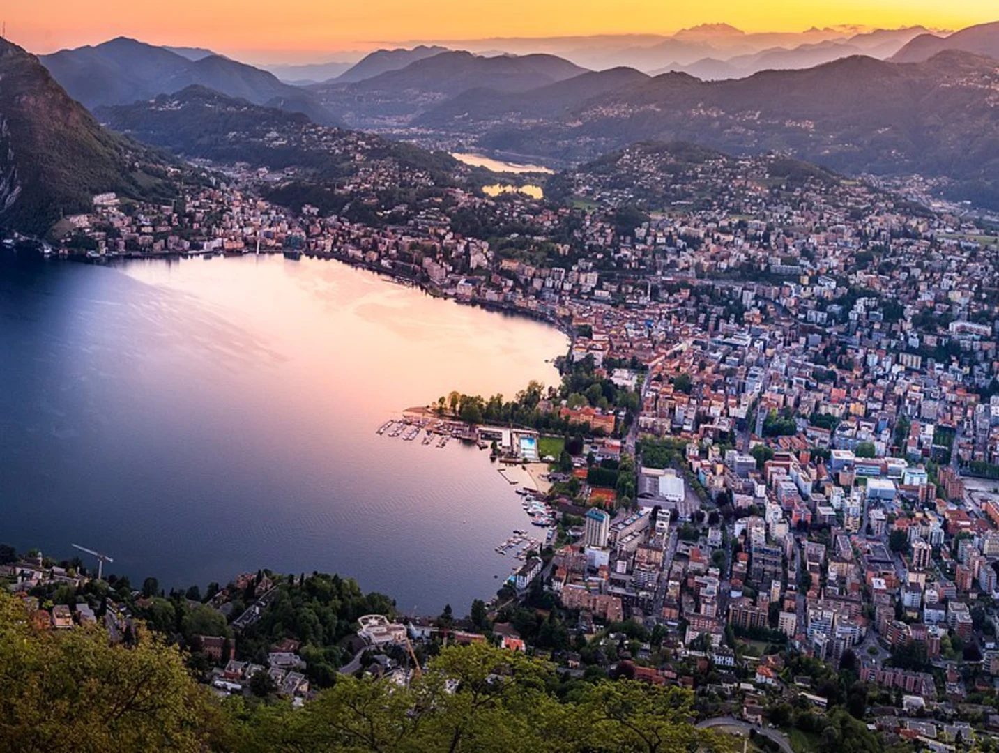An image depicting the trail Capriasca to Lugano Paradiso Trail and its surrounding area.