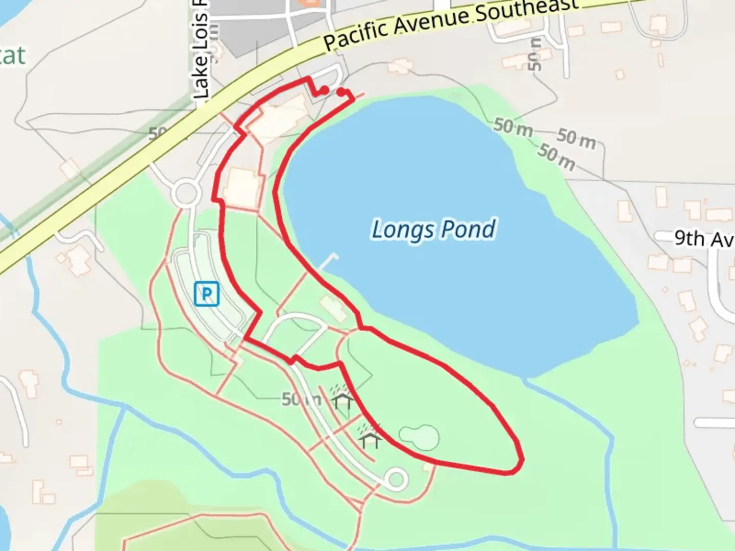 An image depicting the trail Woodland Creek Community Park Loop and its surrounding area.