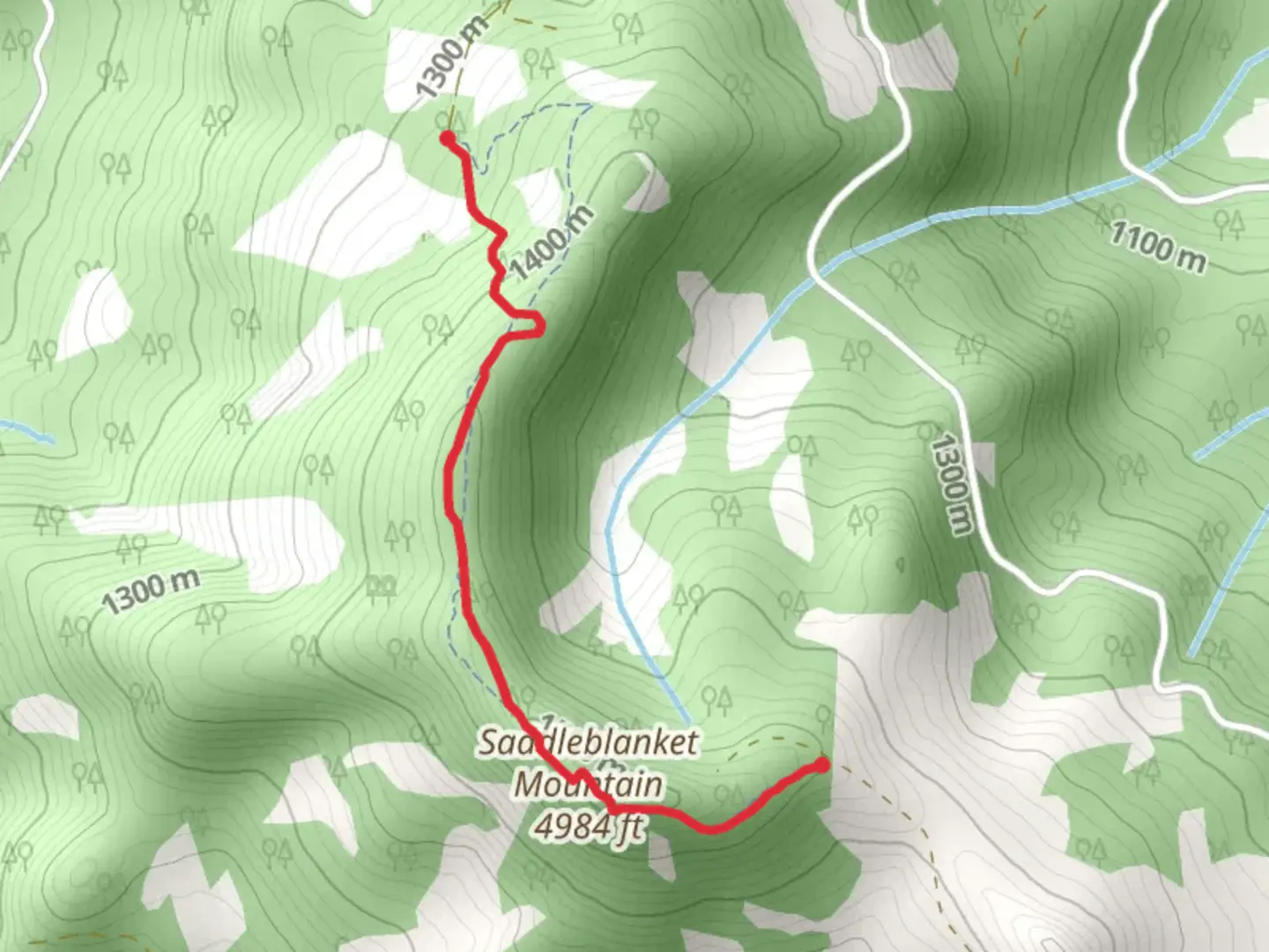 An image depicting the trail Saddleblanket Trail and its surrounding area.