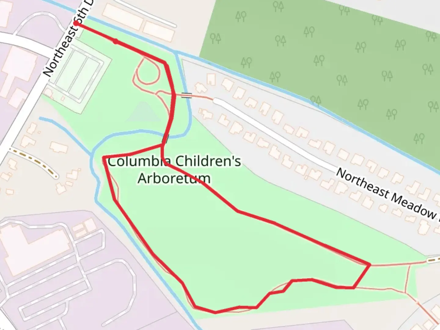An image depicting the trail Columbia Children's Arboretum Loop and its surrounding area.