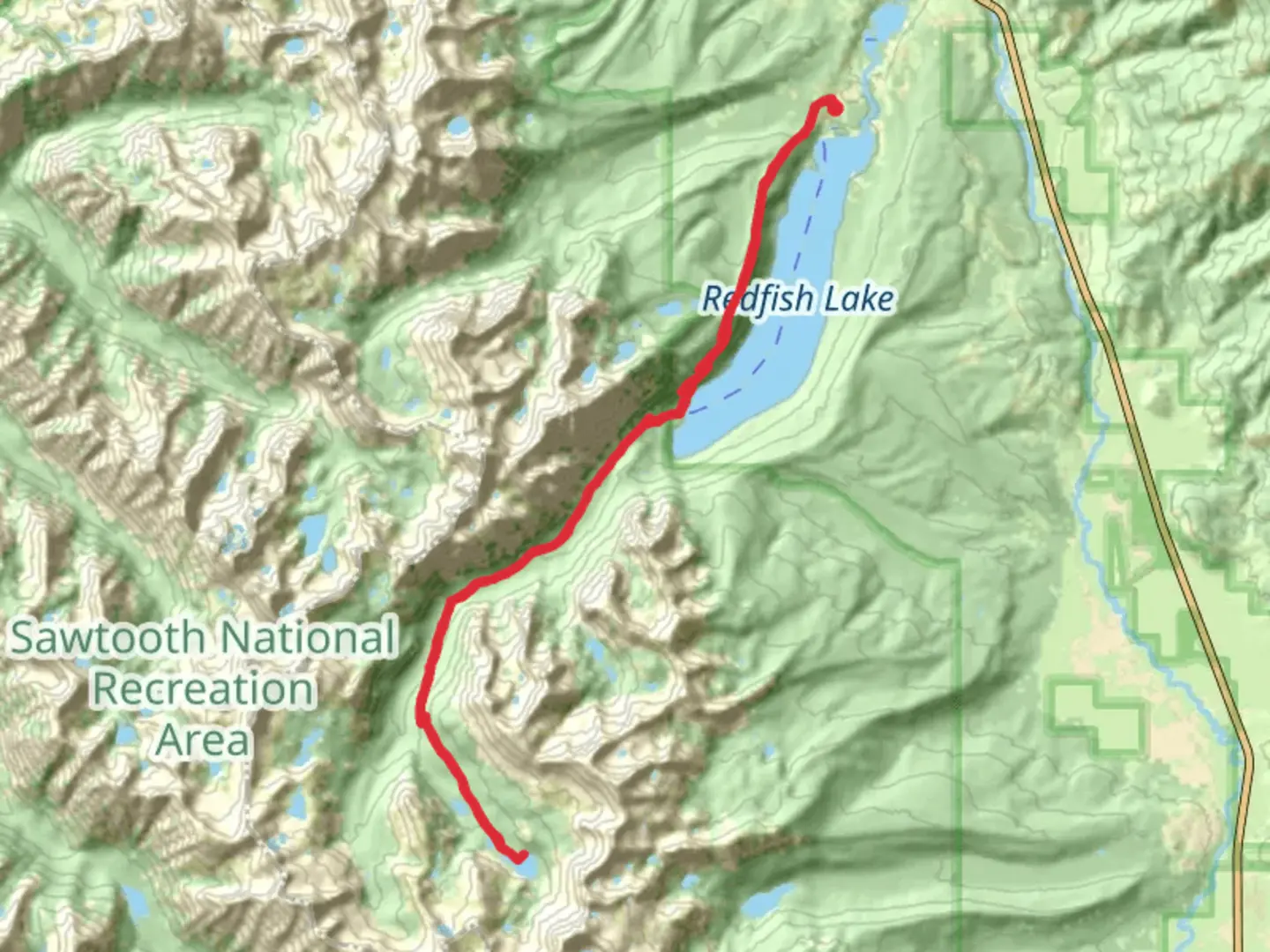 An image depicting the trail Cramer Lakes via Redfish Creek-Baron Creek Trail and its surrounding area.
