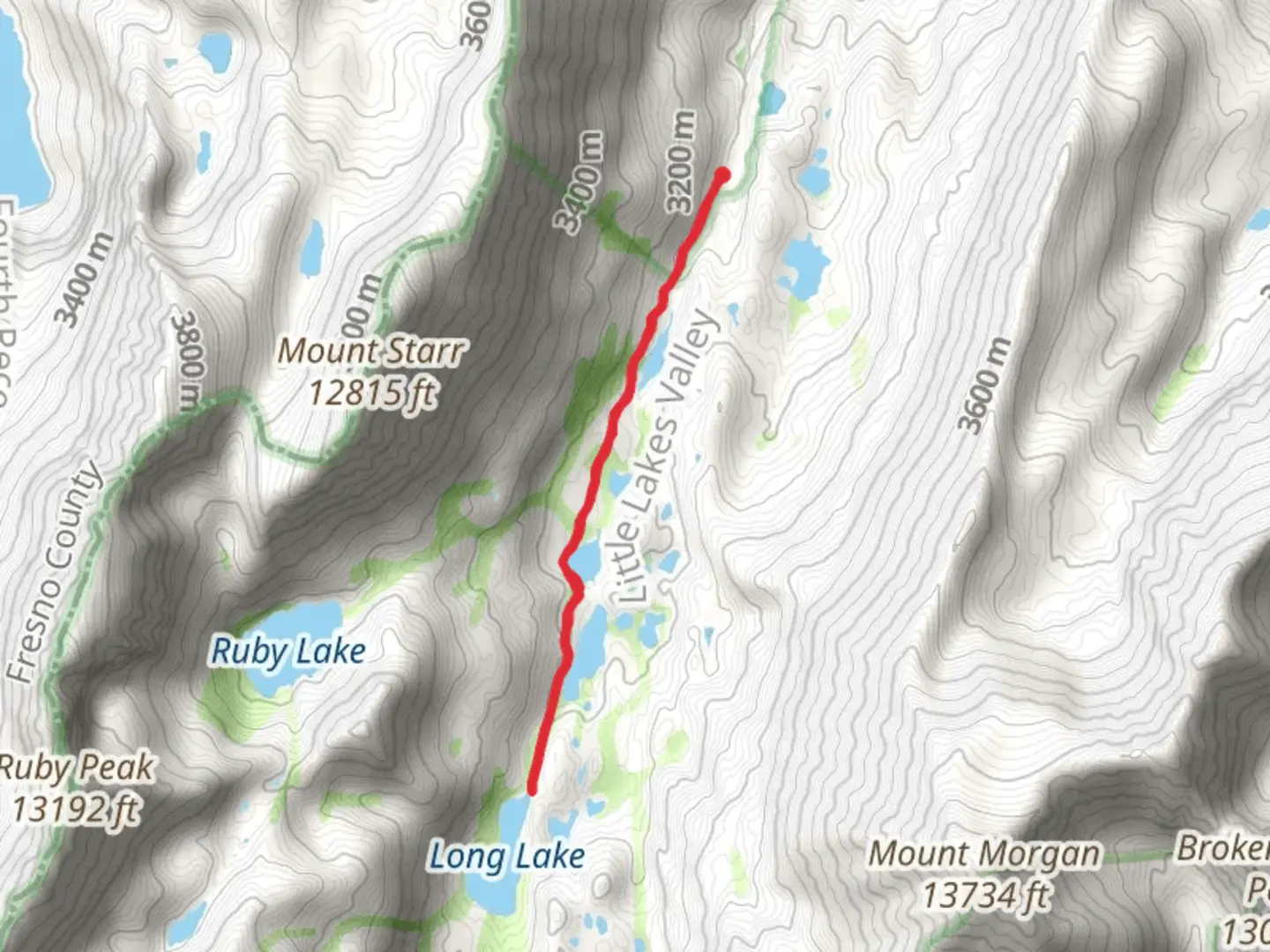 An image depicting the trail Long, Box, Heart and Mack Lakes via Little Lakes Valley Trail and its surrounding area.