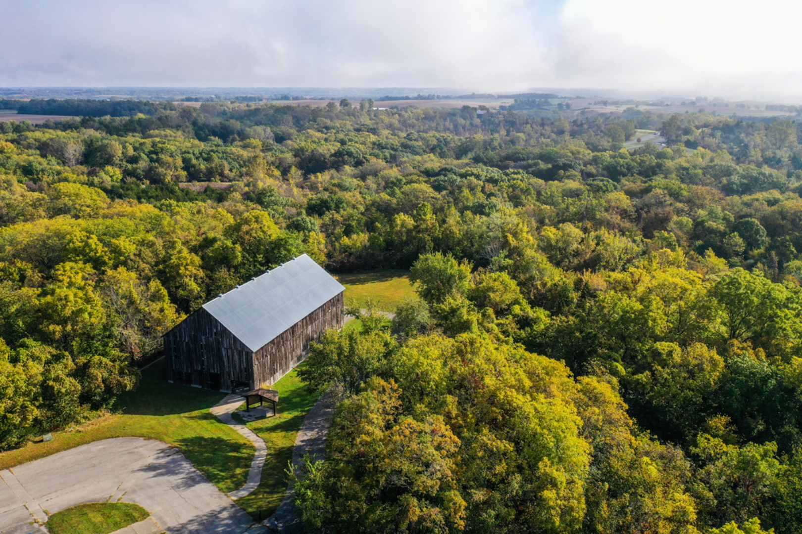 An image depicting the trail Weston Bend State Park Paved Loop and its surrounding area.