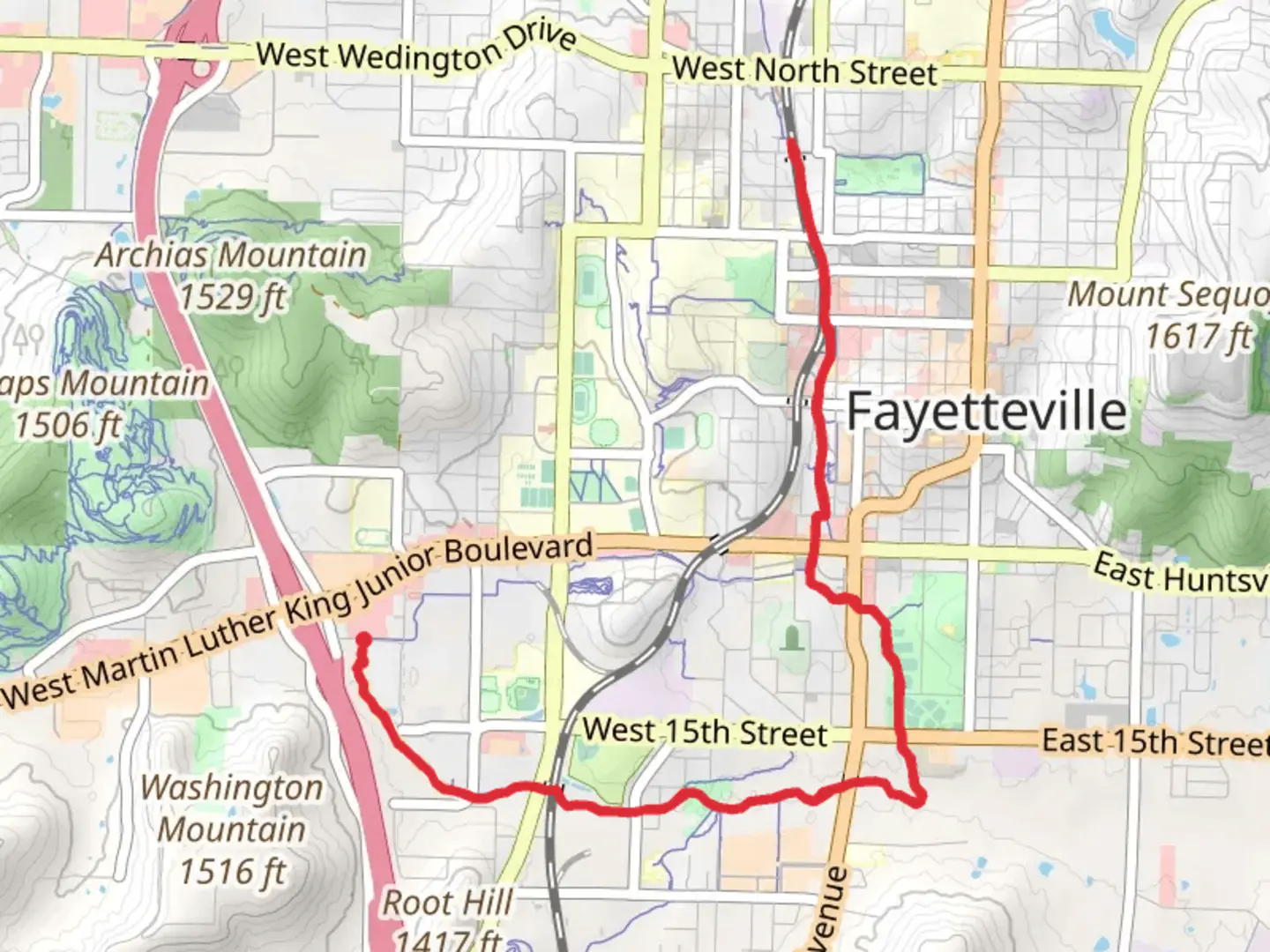 An image depicting the trail Two Branch Trail and Razorback Regional Greenway and its surrounding area.