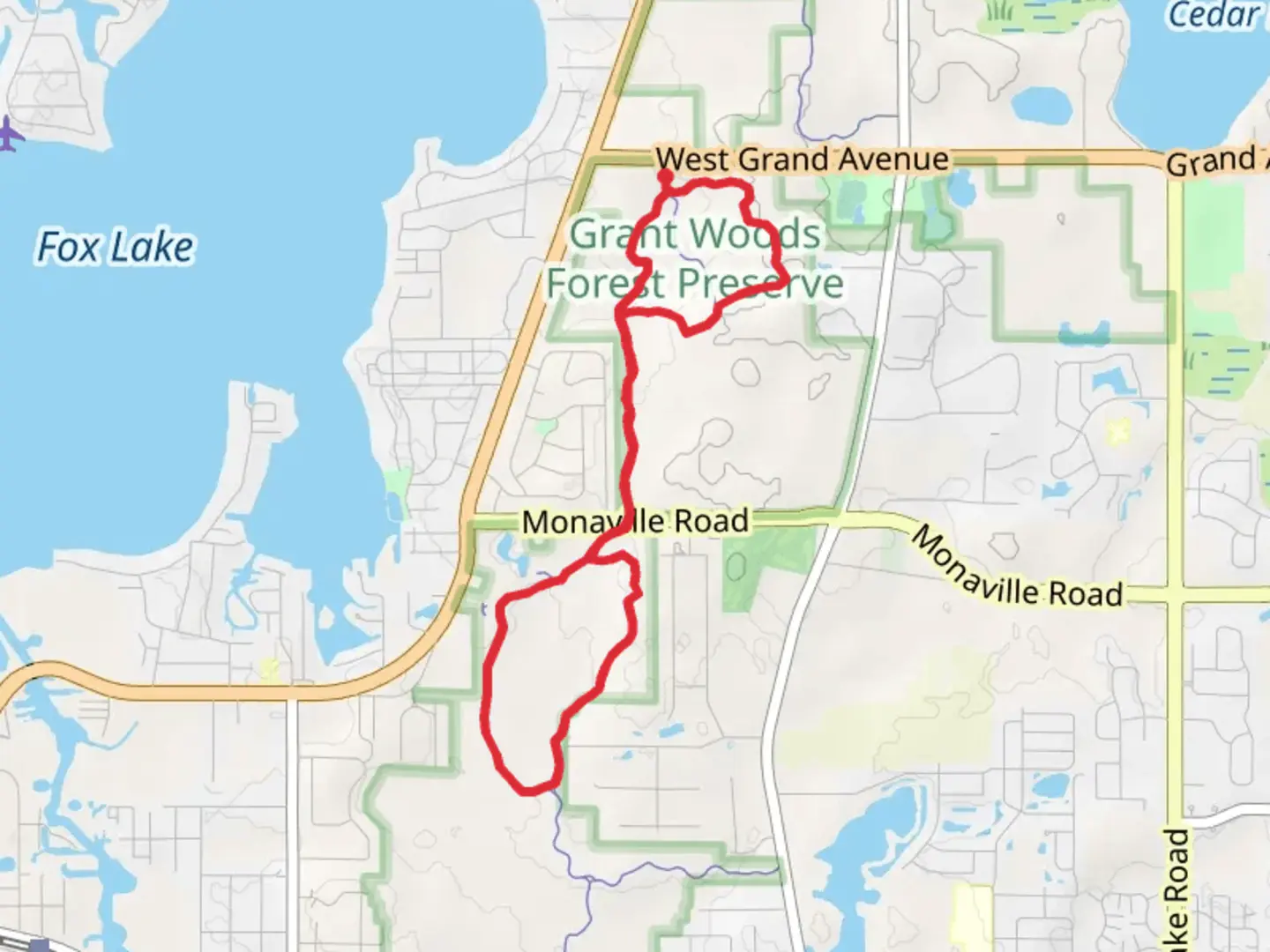 An image depicting the trail Grant Woods Forest Preserve Loop and its surrounding area.