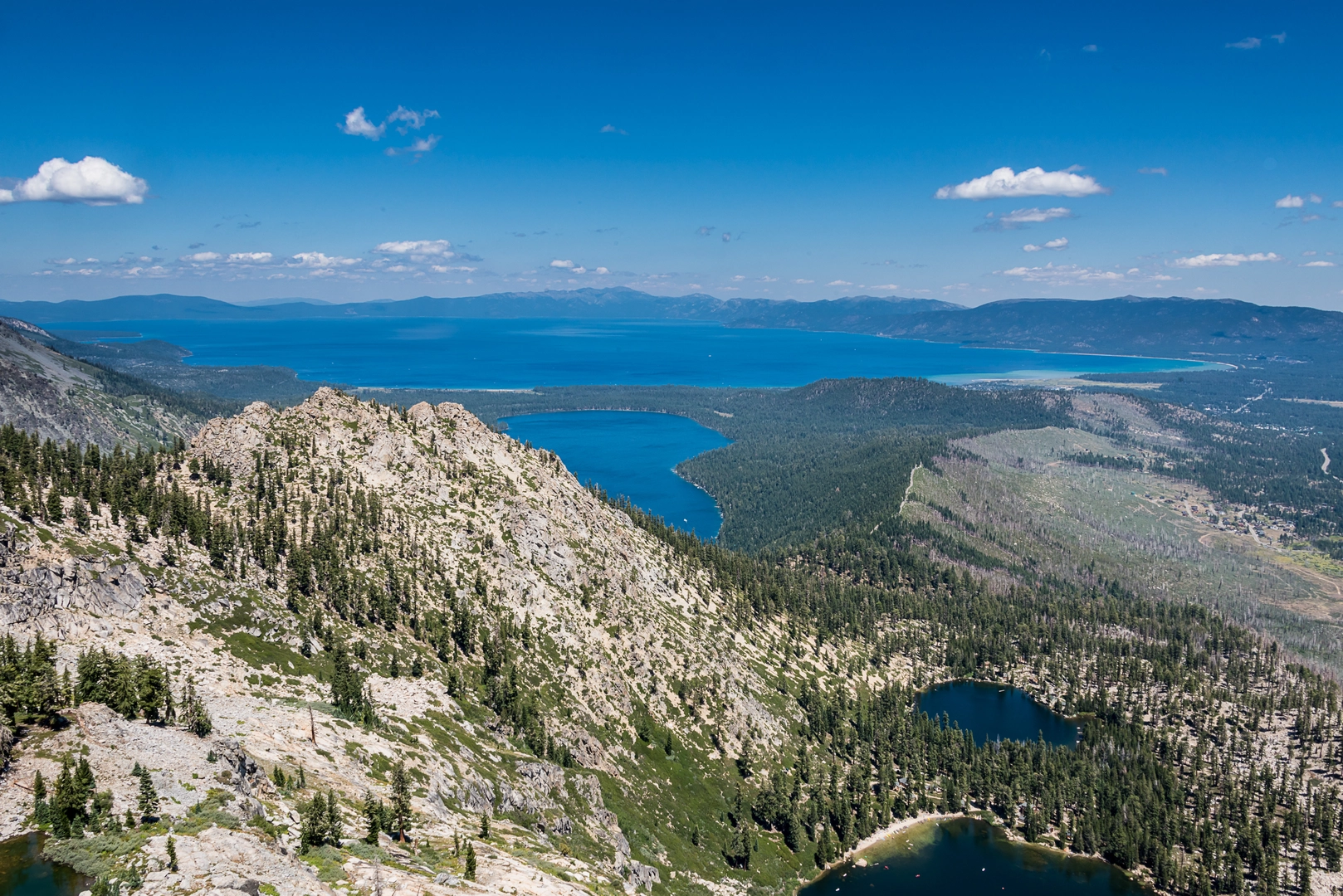 An image depicting the trail Angora Peak and its surrounding area.