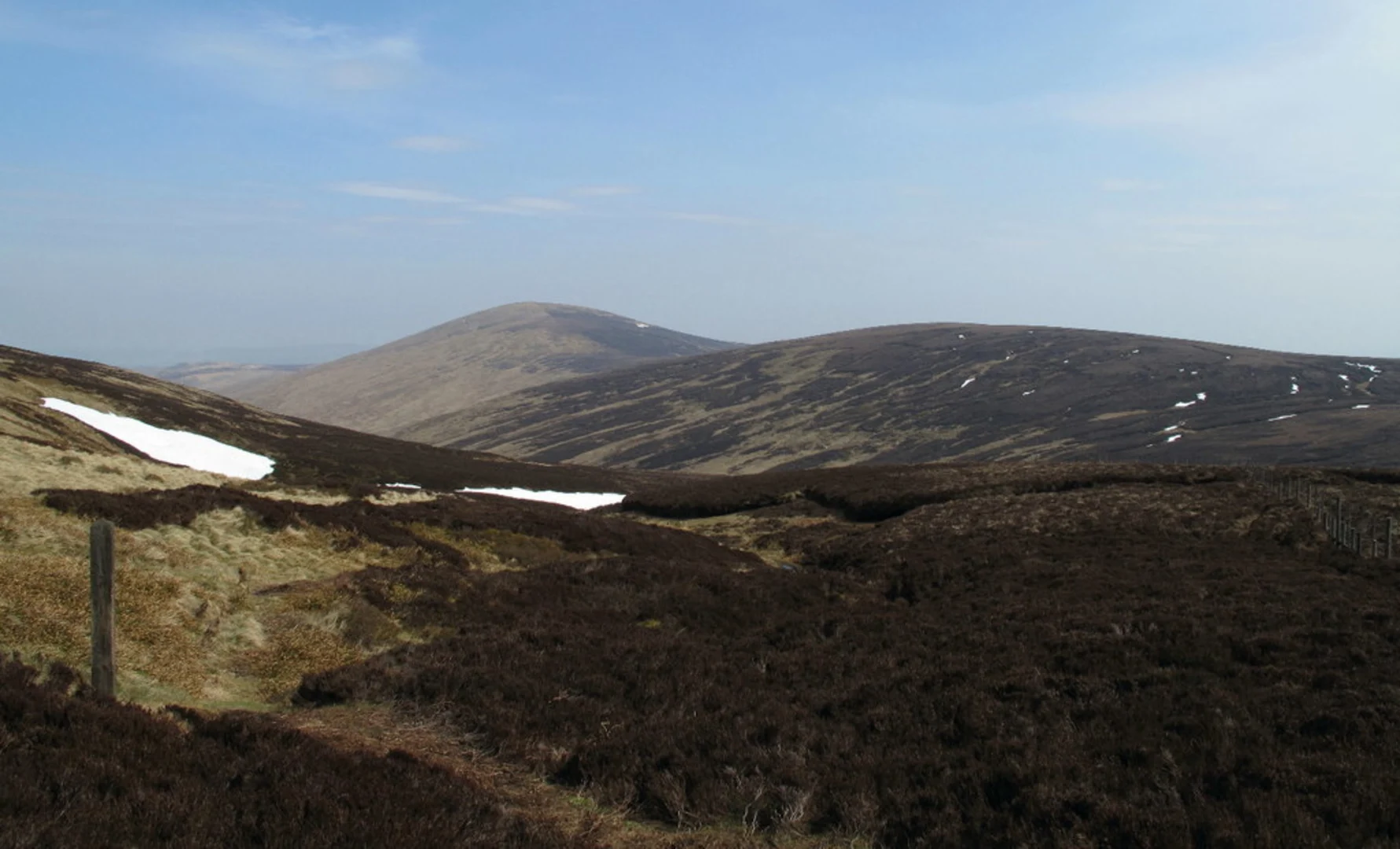 An image depicting the trail Cairn Hill and the Cheviot Loop from Hethpool and its surrounding area.