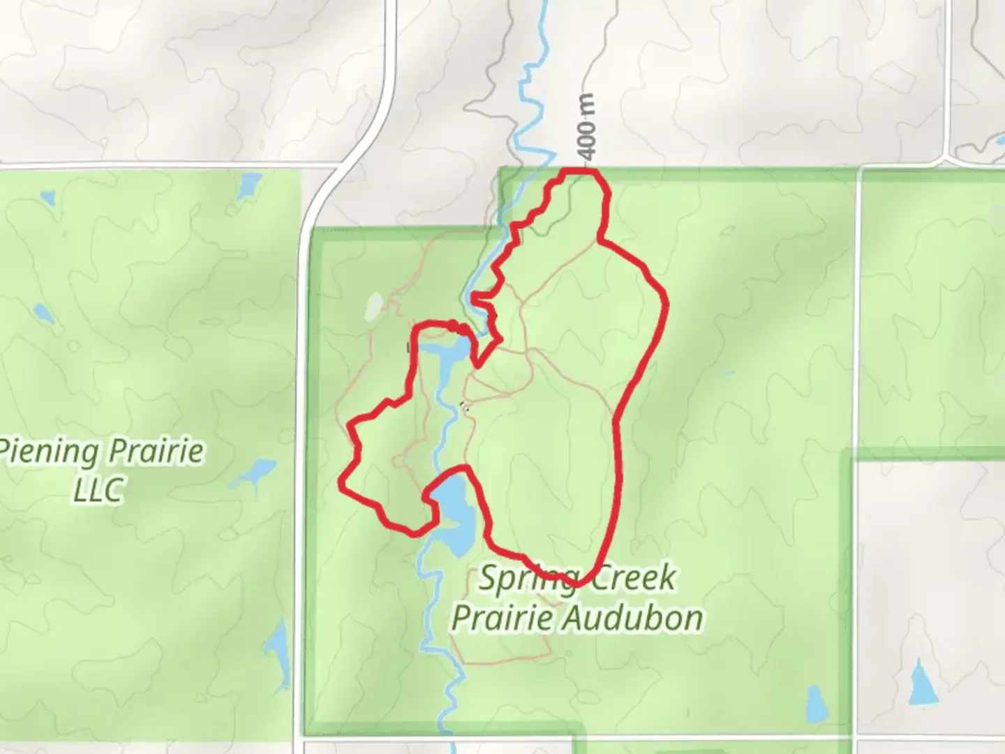 An image depicting the trail Elizabeth Rubendall Briding Trail, Prairie Trail and Woodland Trail and its surrounding area.
