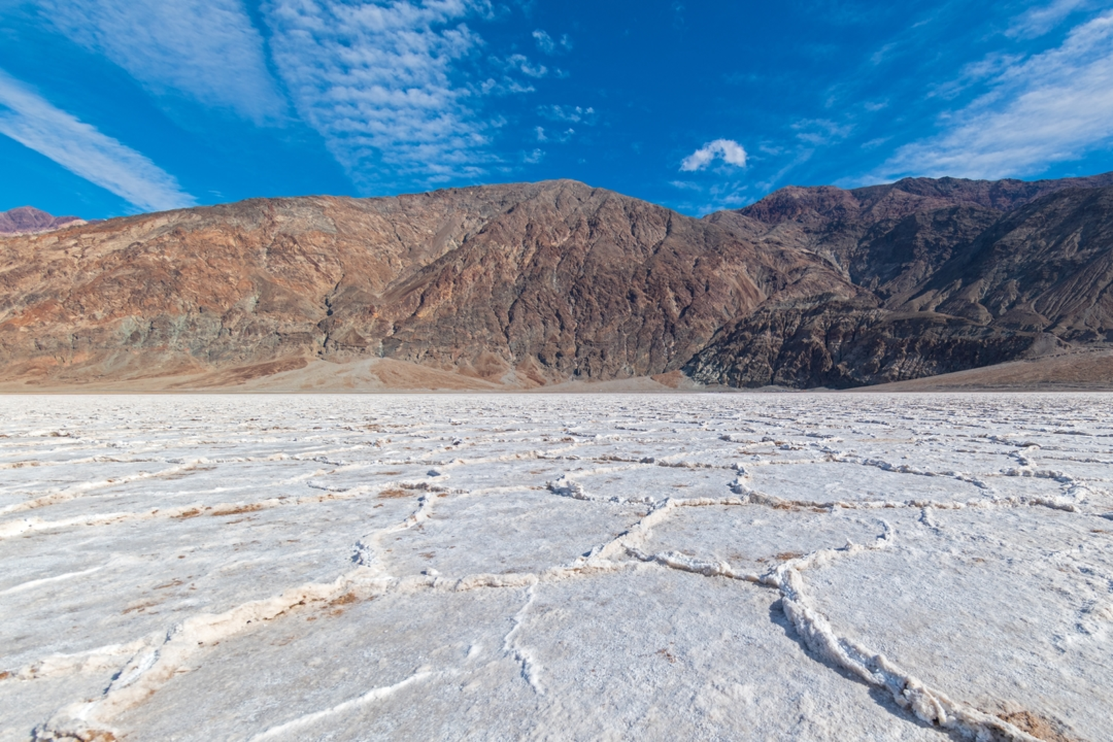 An image depicting the trail Badwater Basin Salt Flats Trail and its surrounding area.