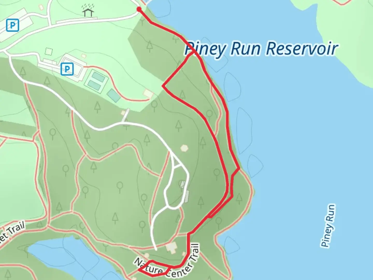 An image depicting the trail Nature Center Loop Trail and its surrounding area.