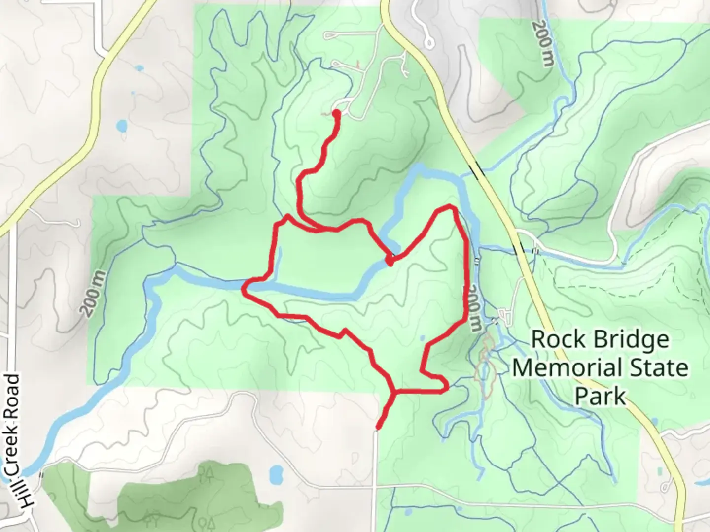 An image depicting the trail White Connector 5 and Spring Brook Loop Trail and its surrounding area.