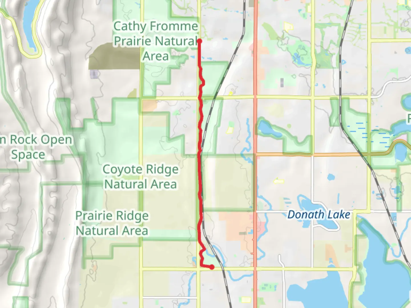 An image depicting the trail Long View Trail - Sunset Vista Natural Area and its surrounding area.