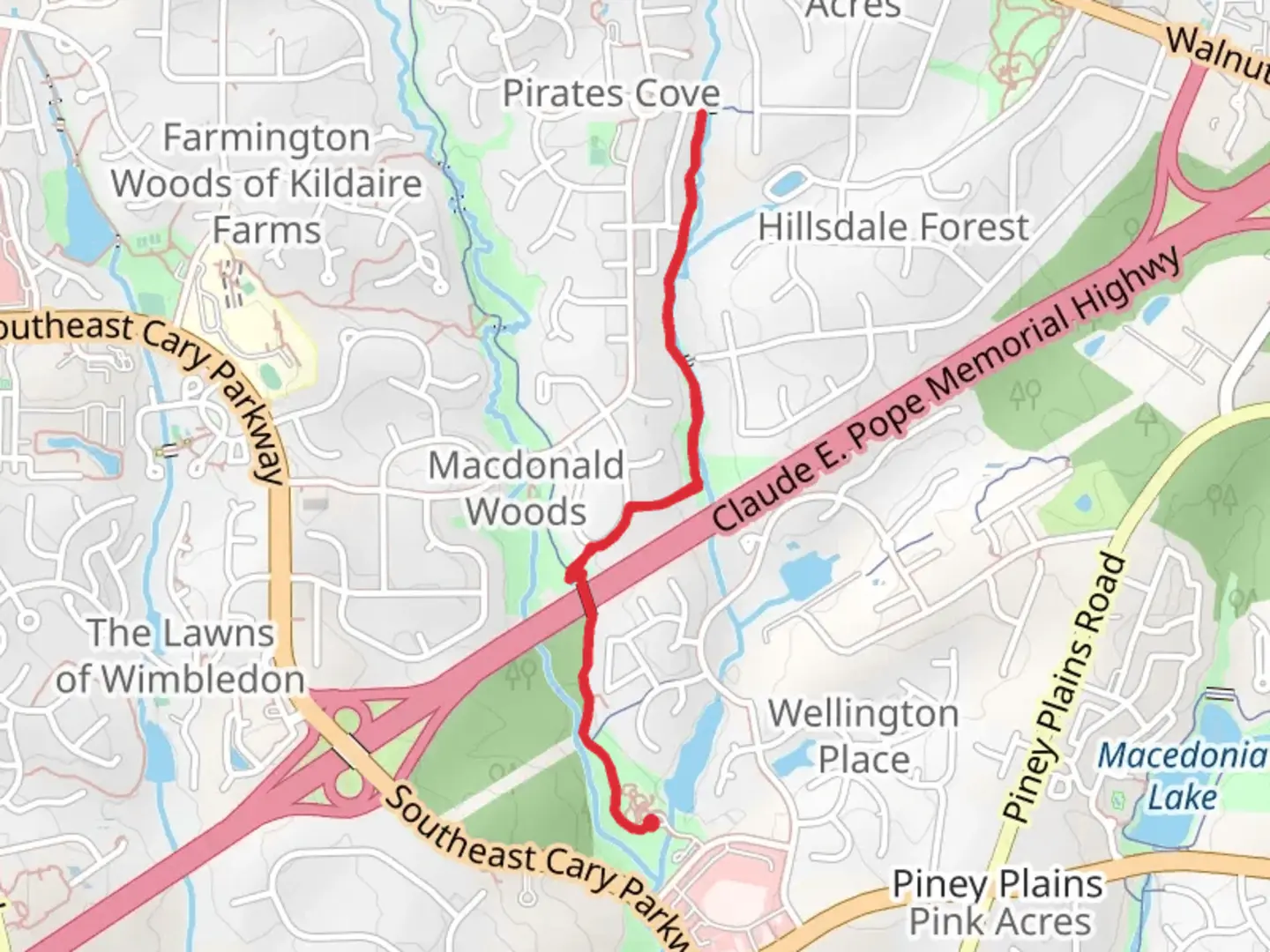 An image depicting the trail Hinshaw Greenway and Pirates Cove Greenway and its surrounding area.