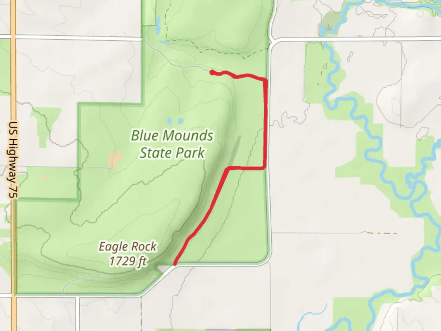 An image depicting the trail Blue Mounds Hiking Trail and its surrounding area.