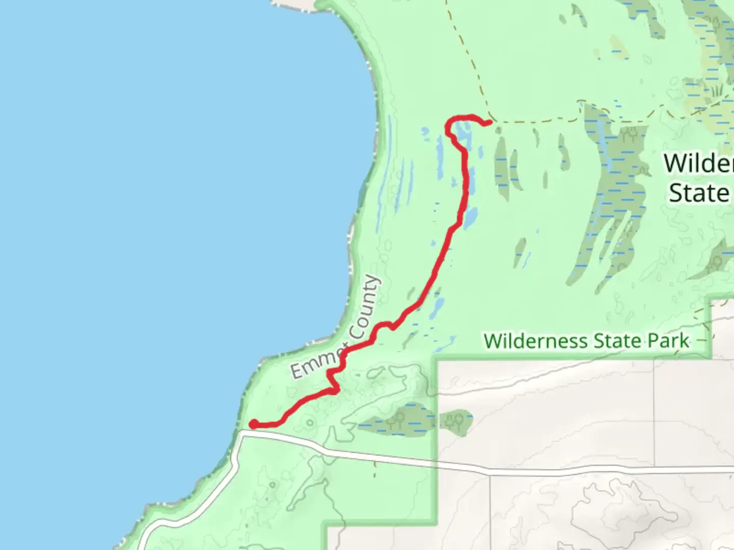 An image depicting the trail Sturgeon Bay Overlook via NCT and its surrounding area.