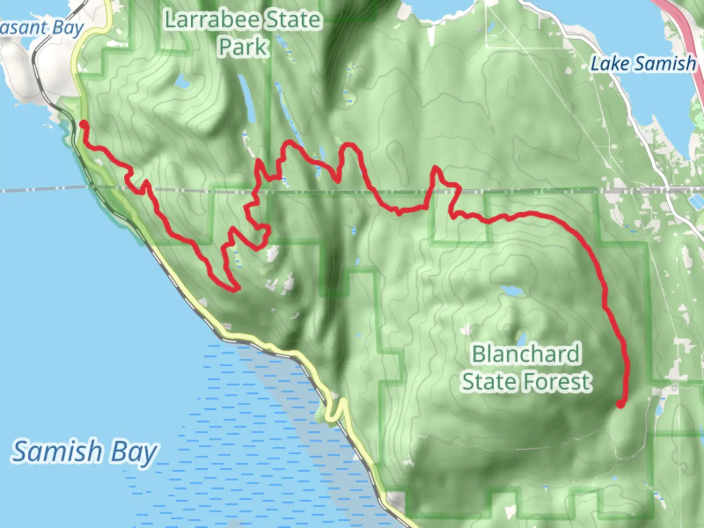 An image depicting the trail South Summit Trail to Wildcat Cove and its surrounding area.