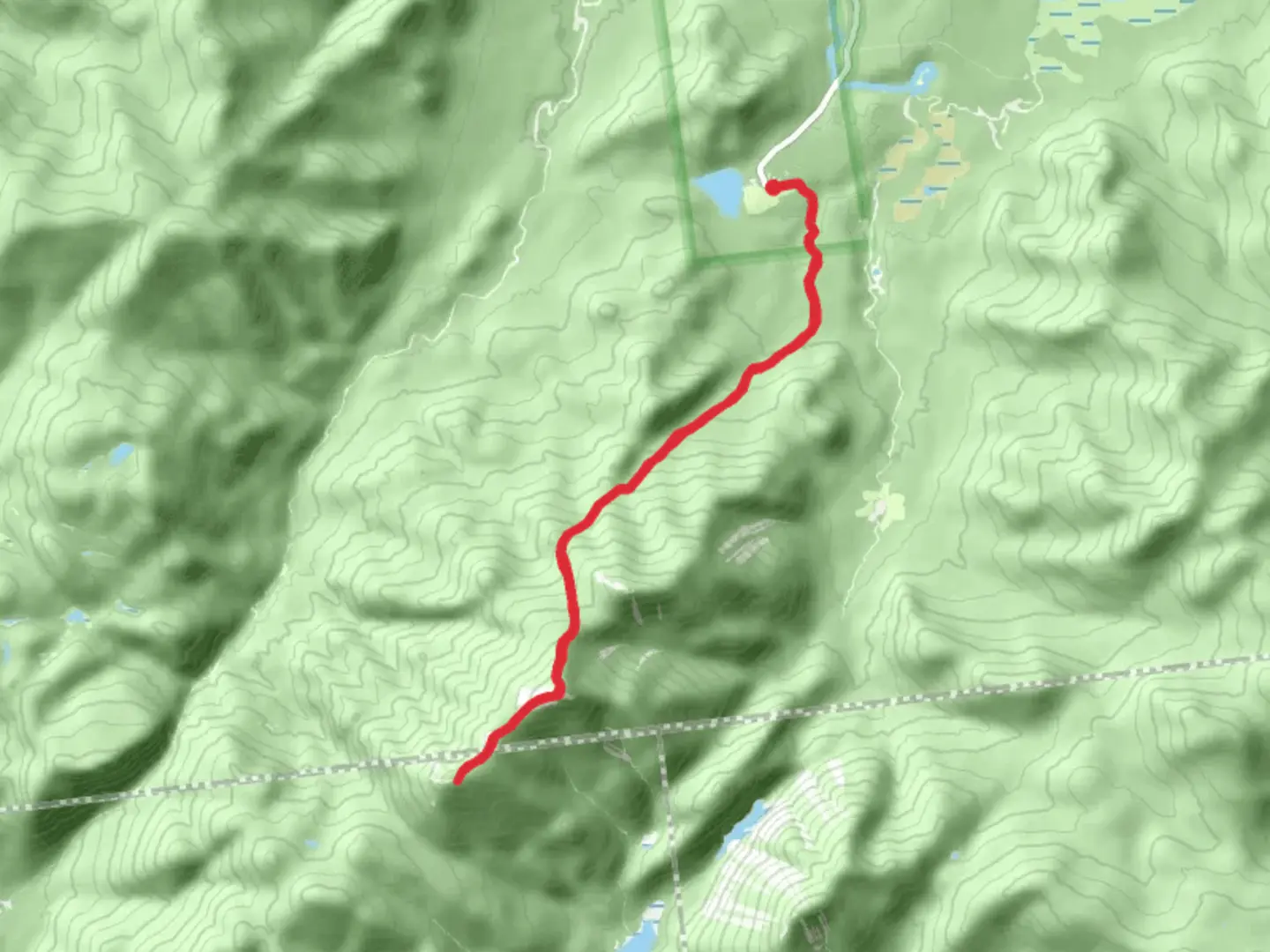 An image depicting the trail Algonquin Peak and Iroquois Peak via MacIntyre Brook and its surrounding area.