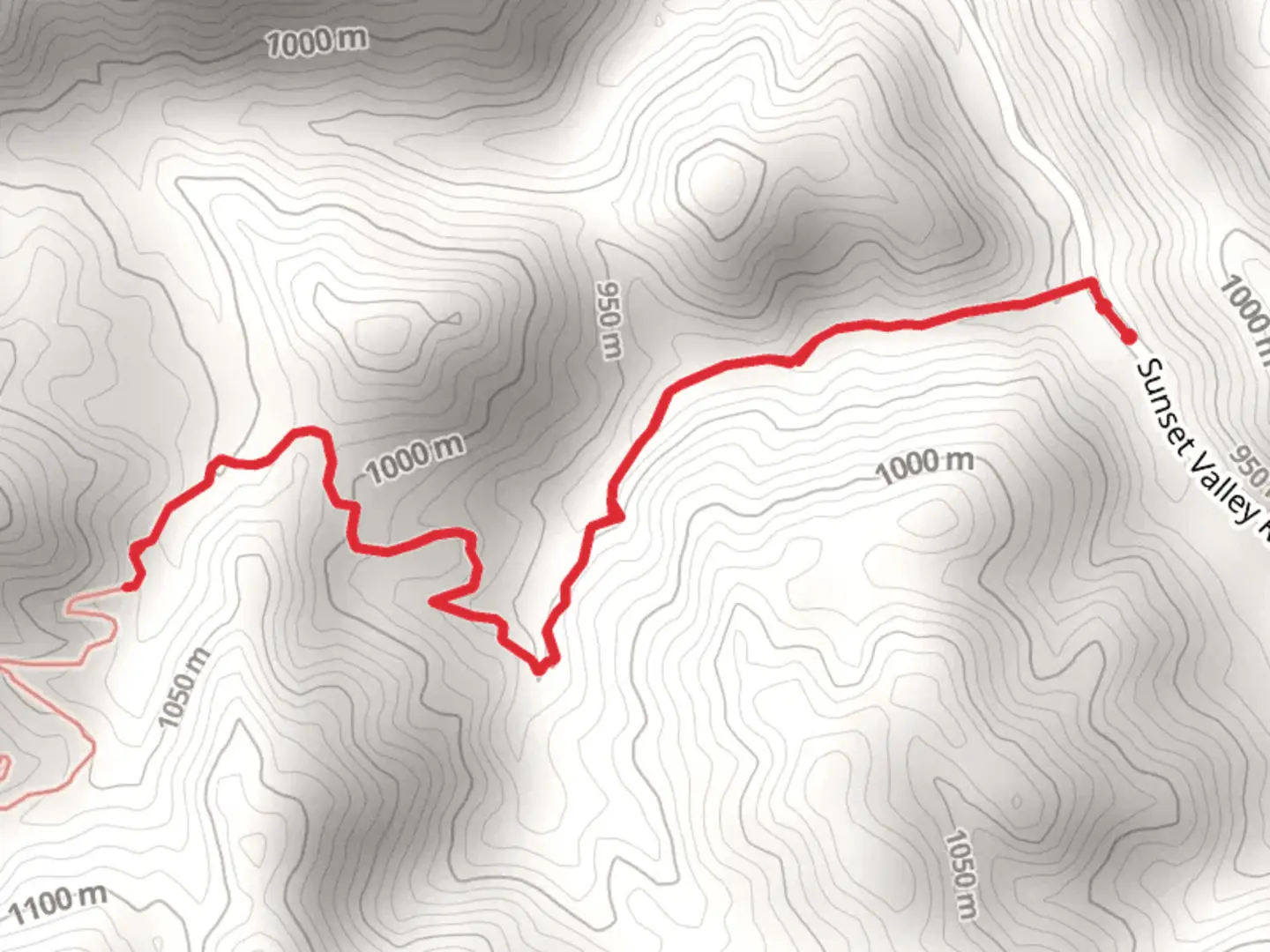An image depicting the trail Sunset Valley Road and its surrounding area.