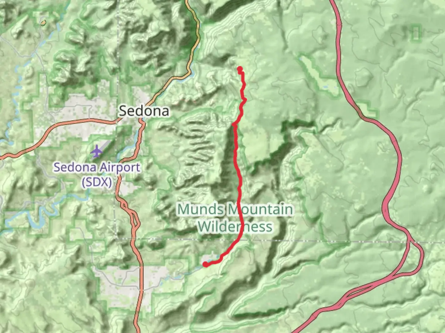An image depicting the trail Jacks Canyon Trail - Schnebly Hill Road and its surrounding area.