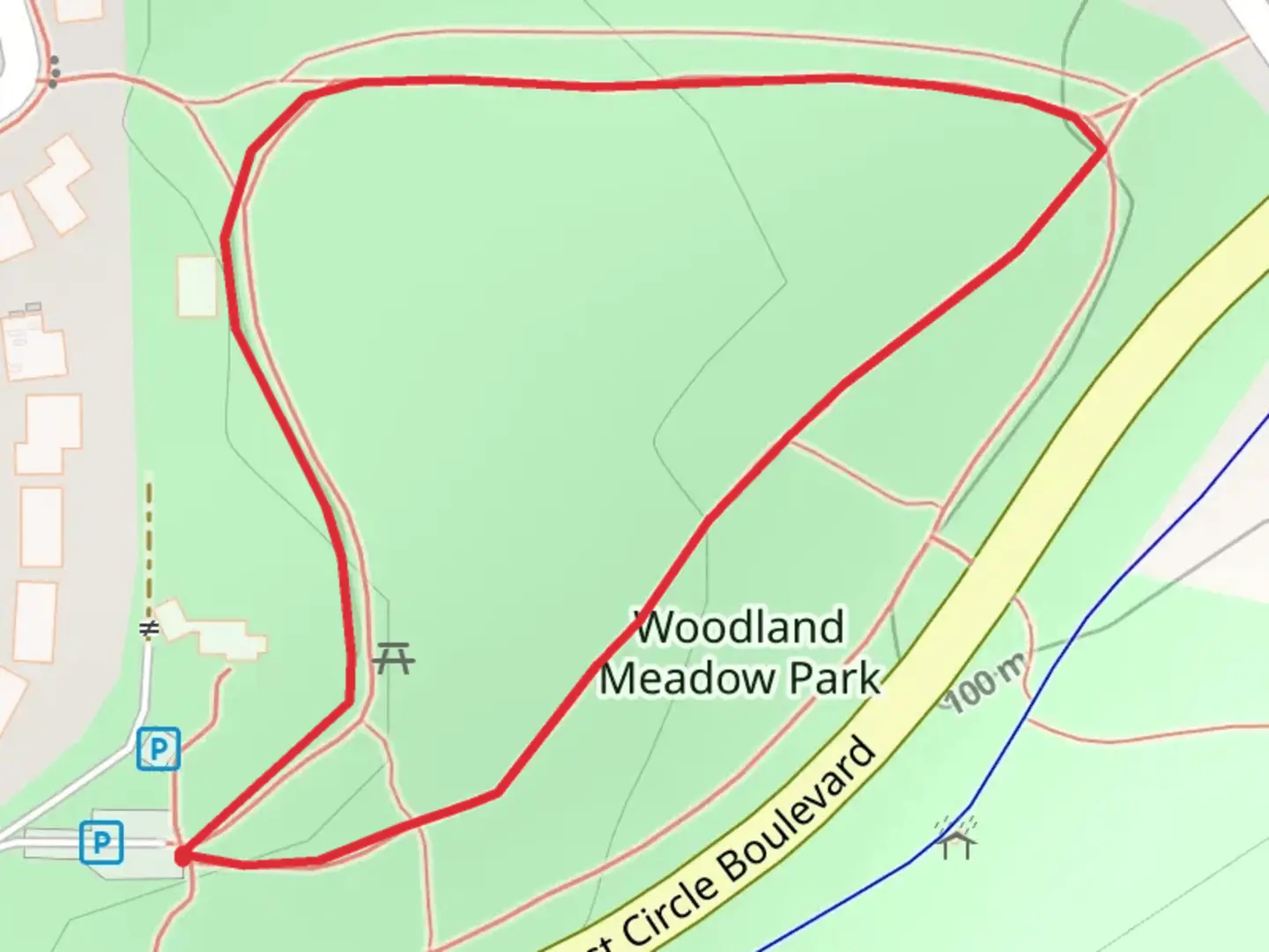 An image depicting the trail Woodland Meadow Park Loop and its surrounding area.