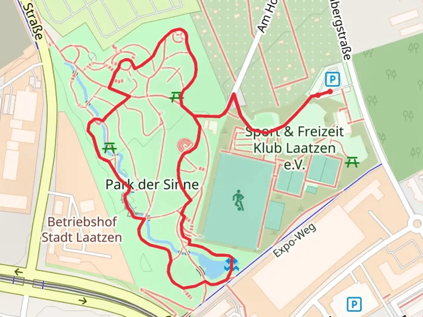 An image depicting the trail Kulturbuehne in Park of the senses and its surrounding area.