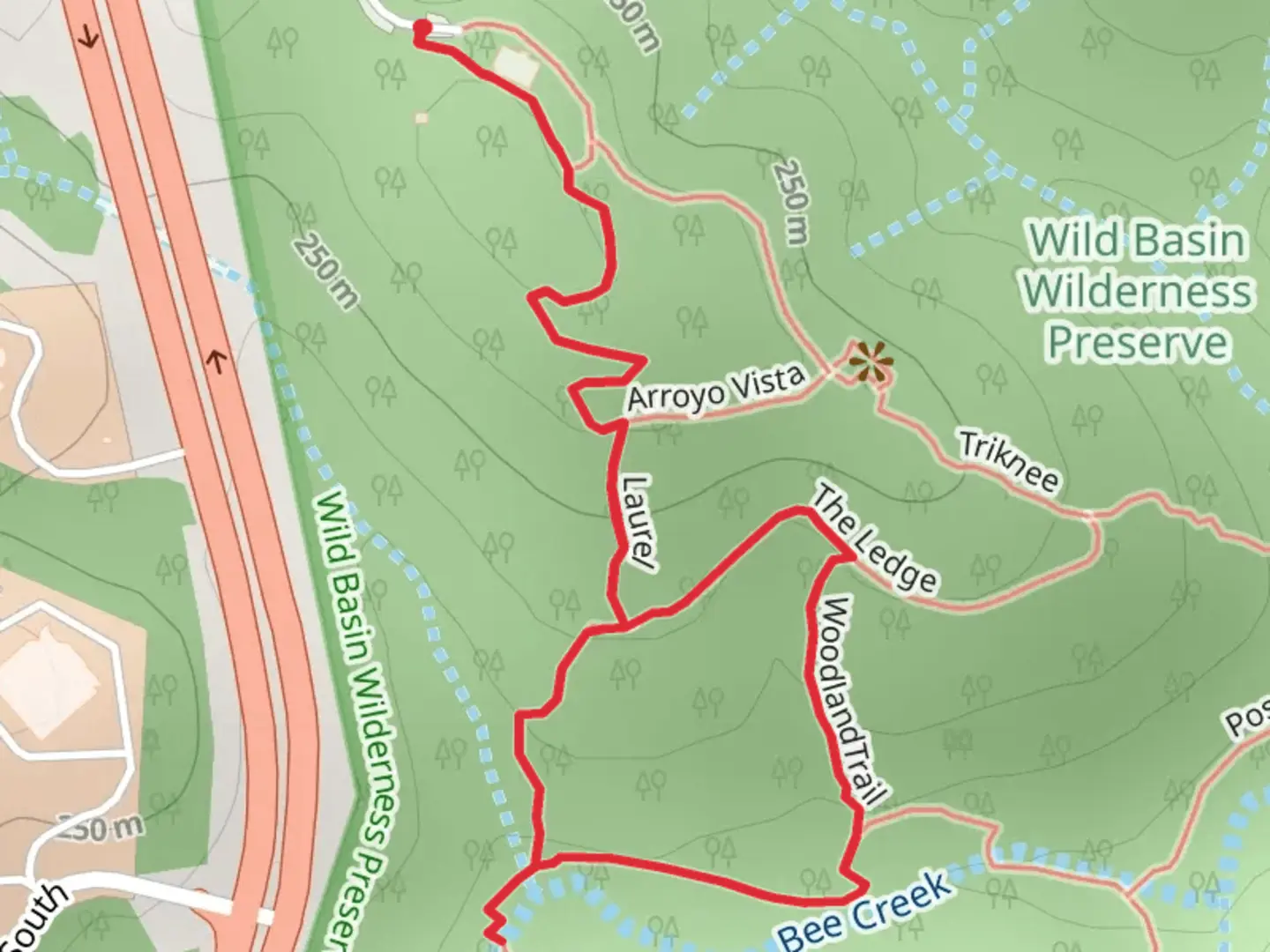 An image depicting the trail Woodland trail and Yaupon Trail and its surrounding area.