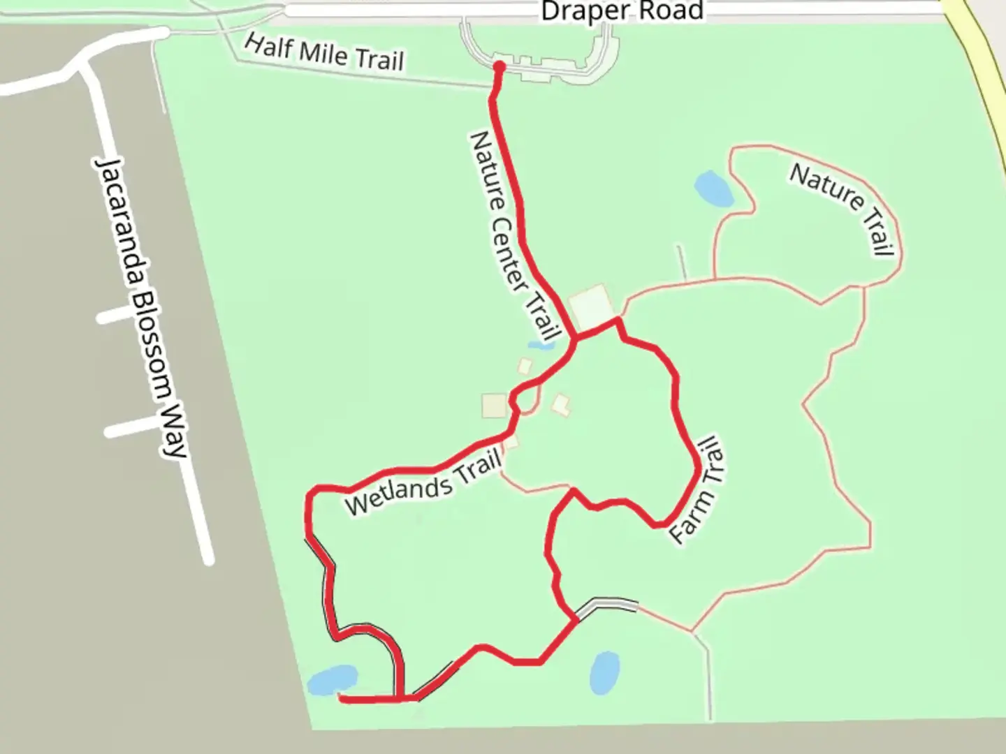 An image depicting the trail Walter's Pond Loop via Nature Center Trail and its surrounding area.