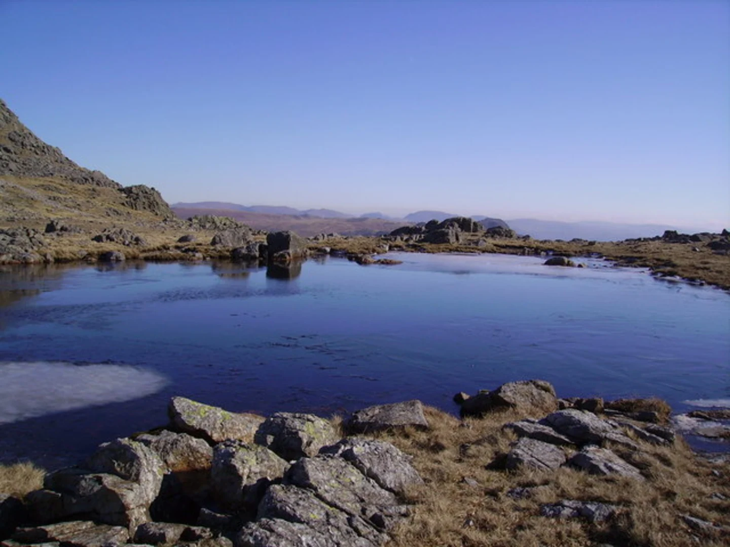 An image depicting the trail Pike of Blisco, Long Top and Three Tarns Loop and its surrounding area.