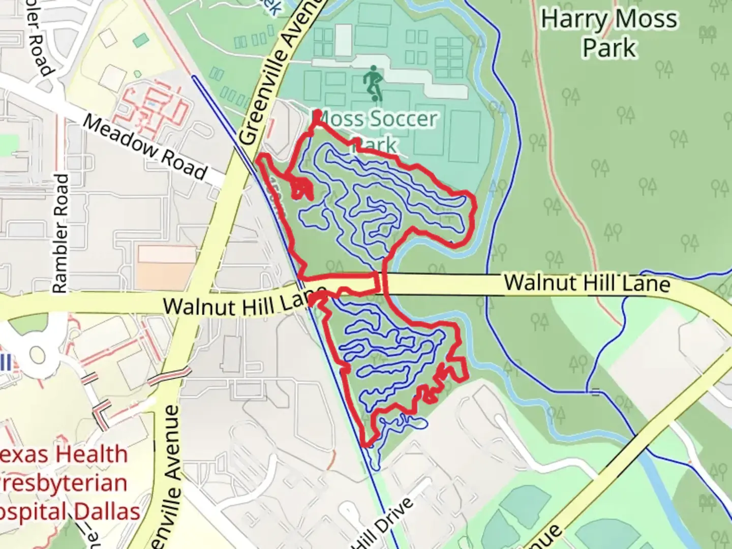 An image depicting the trail Blue and Green Loop - Harry S Moss Park and its surrounding area.