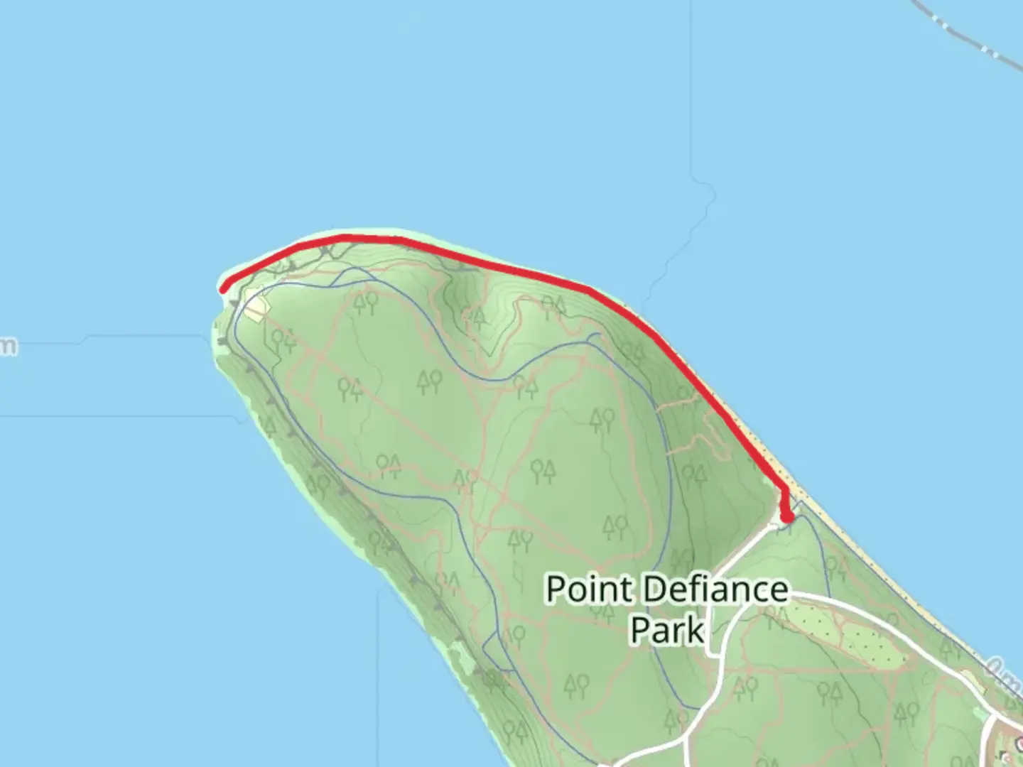 An image depicting the trail Owen Beach and its surrounding area.