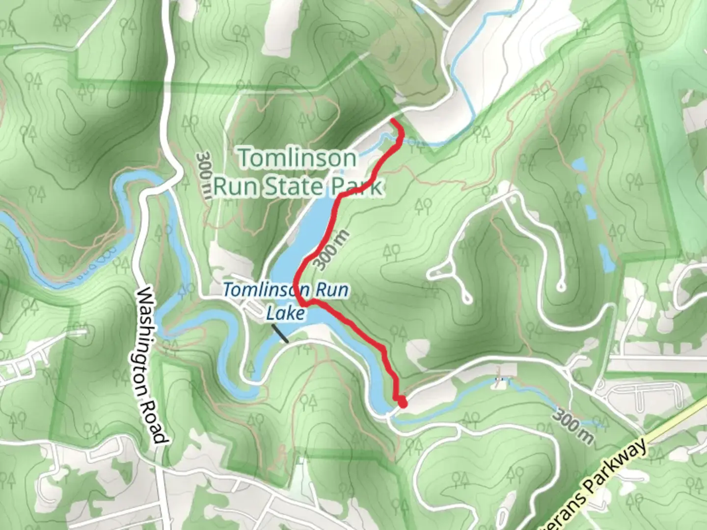 An image depicting the trail Tomlinson Run Lake - Big Foot Trail and its surrounding area.