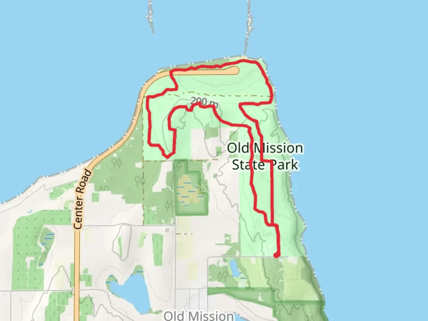 An image depicting the trail Old Mission Lighthouse Park Loop and its surrounding area.