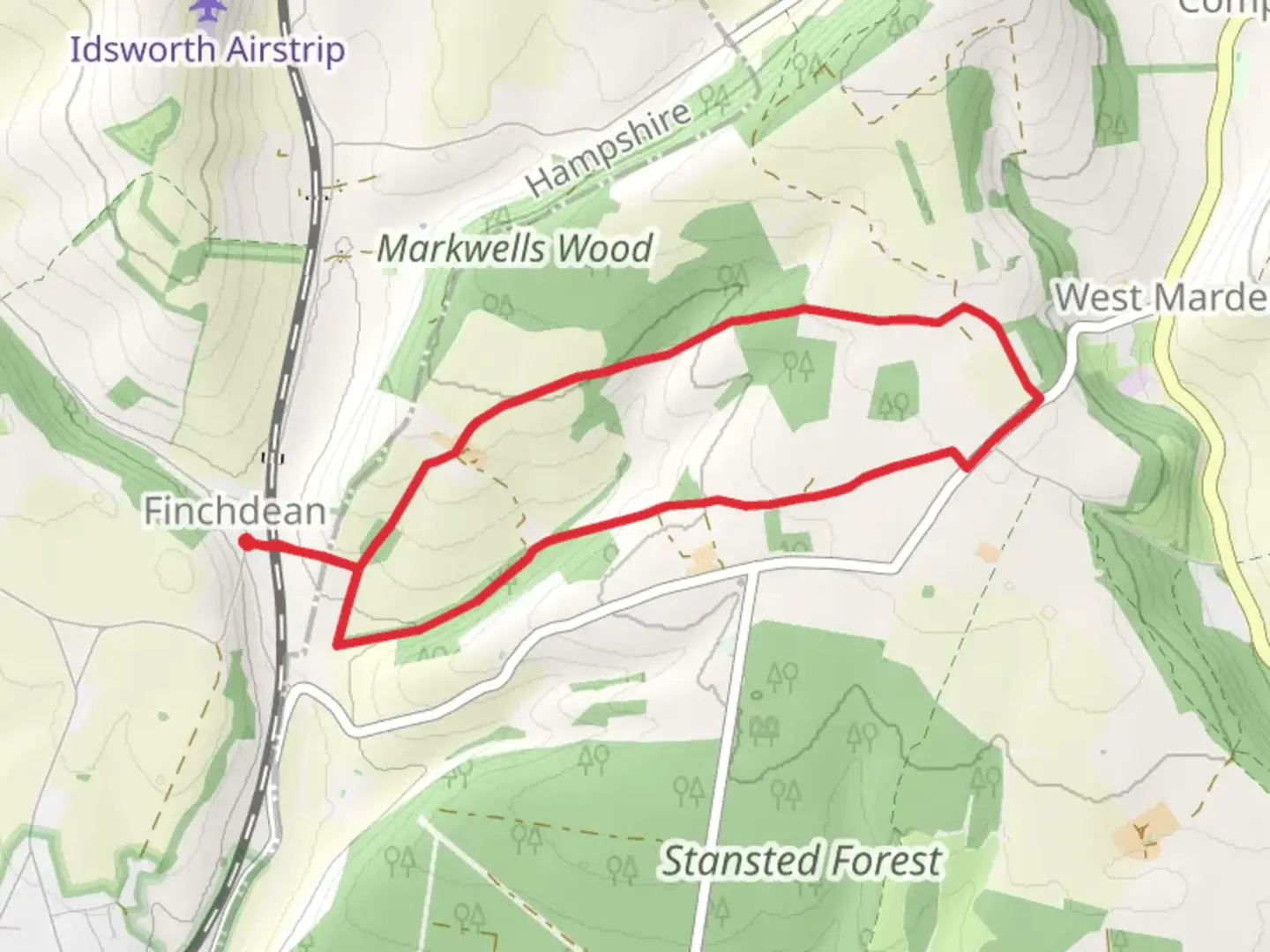 An image depicting the trail Grub Copse Loop - Finchdean and its surrounding area.
