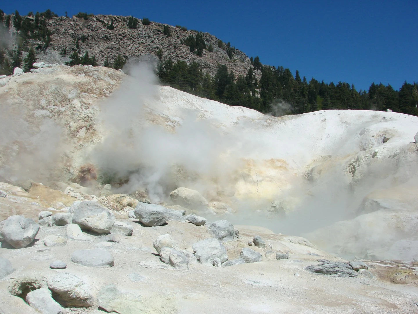 An image depicting the trail Bumpass Hell Trail Loop and its surrounding area.