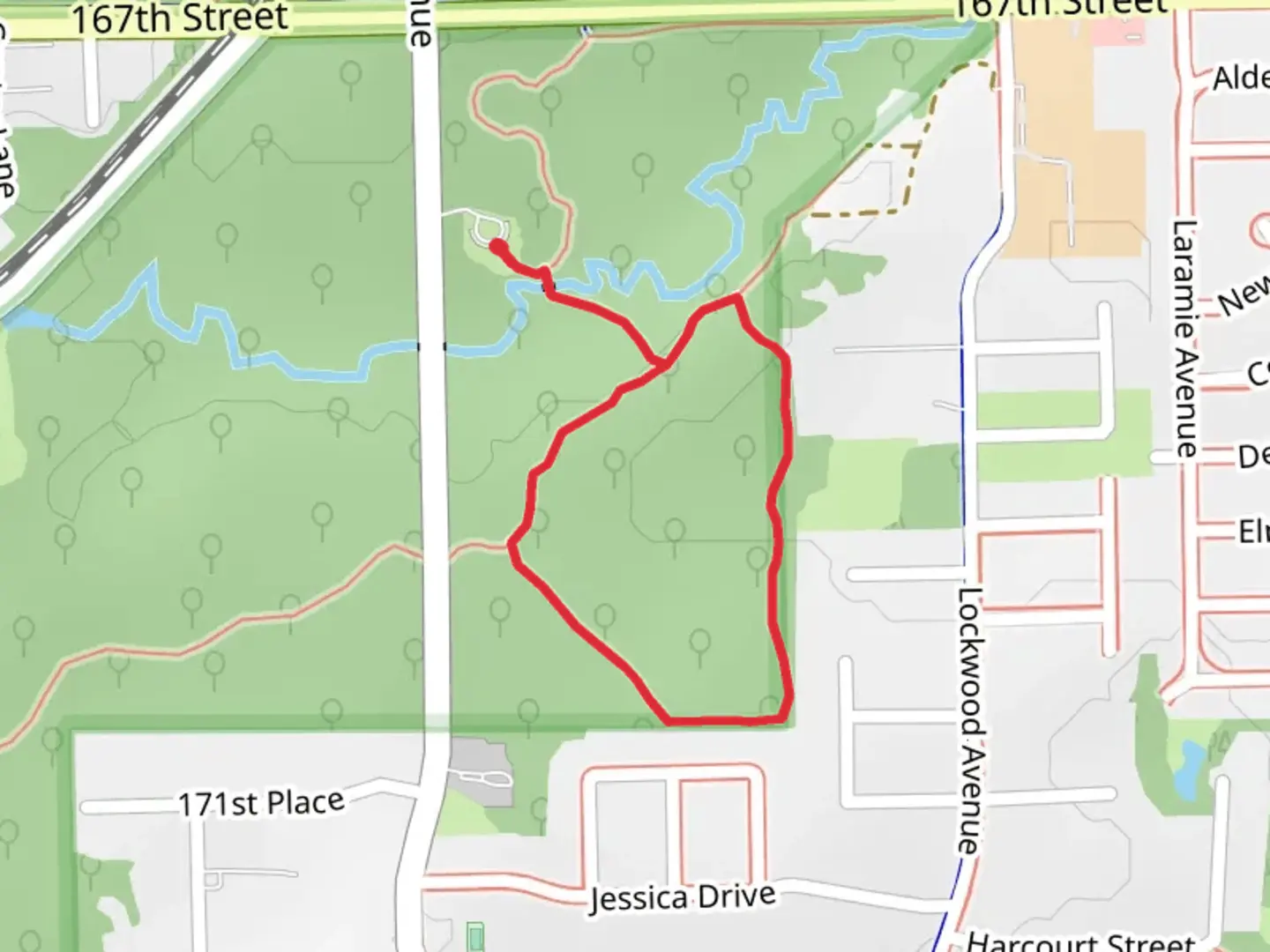 An image depicting the trail Tinley Creek Brown Unpaved Loop and its surrounding area.