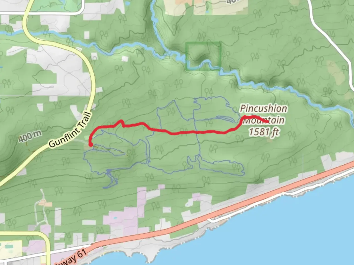 An image depicting the trail Pincushion Mountain and its surrounding area.