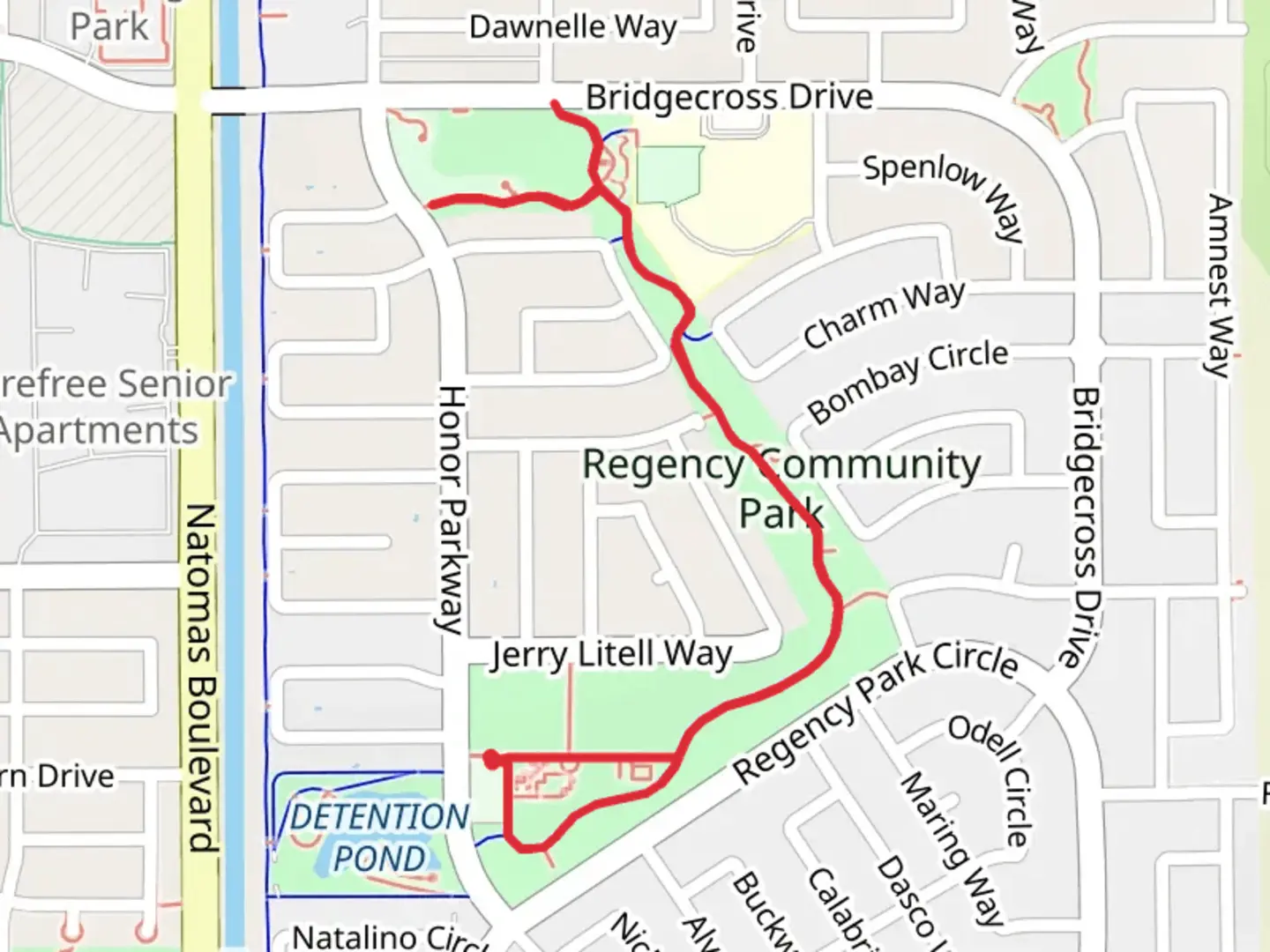 An image depicting the trail Regency Community Park Walk and its surrounding area.